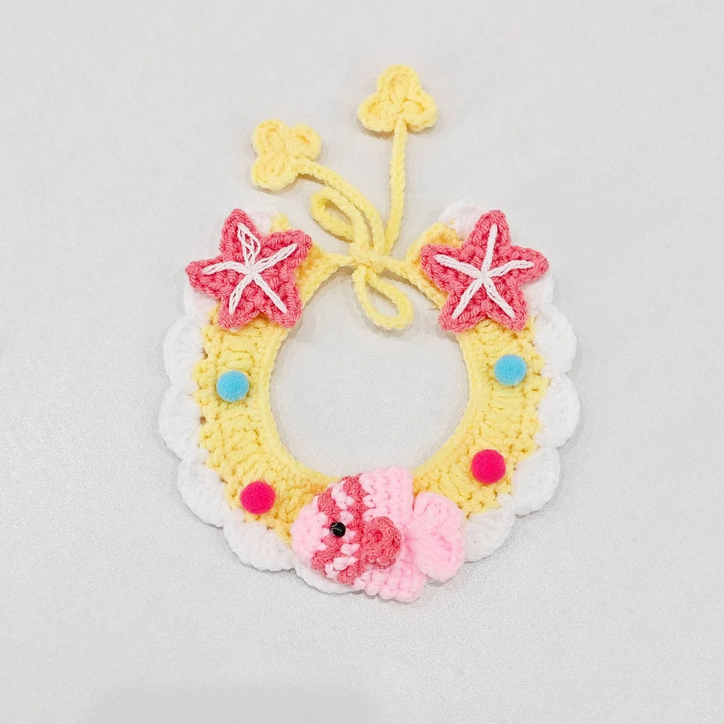 Hand-woven wool cat collar with cartoon Underwater World pattern in blue, size example on a light background