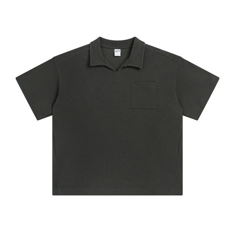 Cotton loose-fit drop-shoulder short sleeve top in Paris forest green, front view, with simple lapel neckline