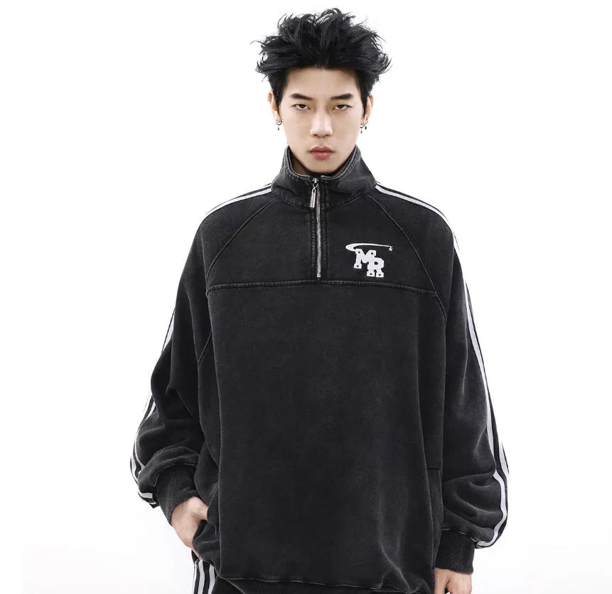 Black retro sports hoodie with a stand collar and long sleeves on a mannequin.