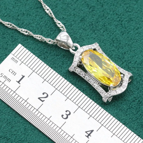 Anti-allergy zircon jewellery set with necklace, earrings, ring, and bracelet in yellow or olive colour.