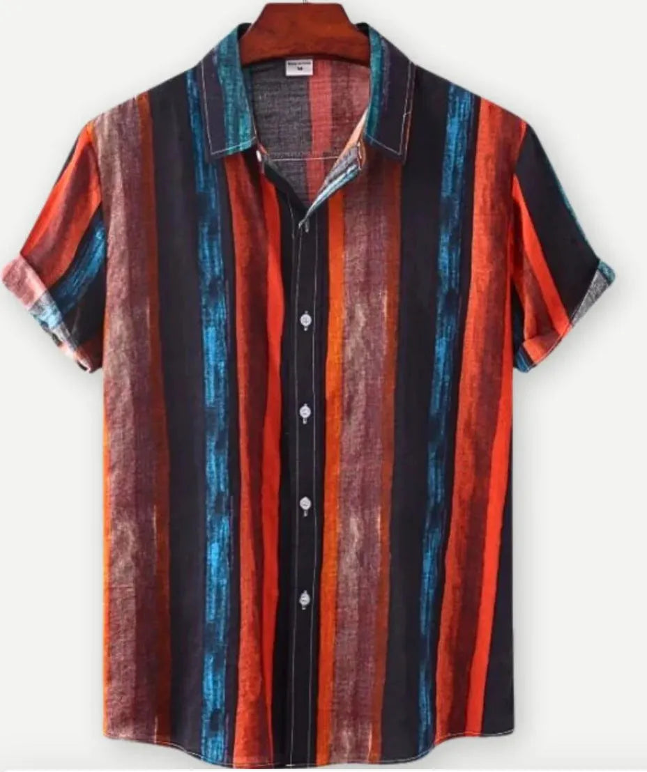 Man wearing a short sleeve Hawaiian shirt with a blue and white floral digital print and a lapel collar.