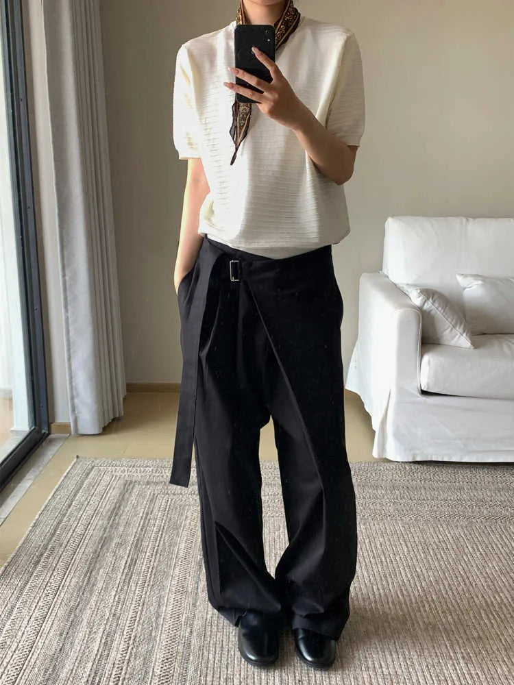 Black straight-leg trousers with adjustable waistband and single pleat design in Tencel cotton fabric