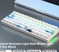 61-key bluish-black and white mechanical keyboard with hot-swap switches on desk