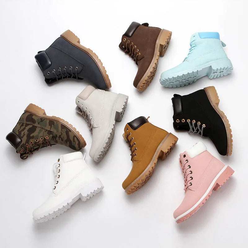 Pink men's high-top Martin boots with front laces and a round toe, showing the velvet lining.