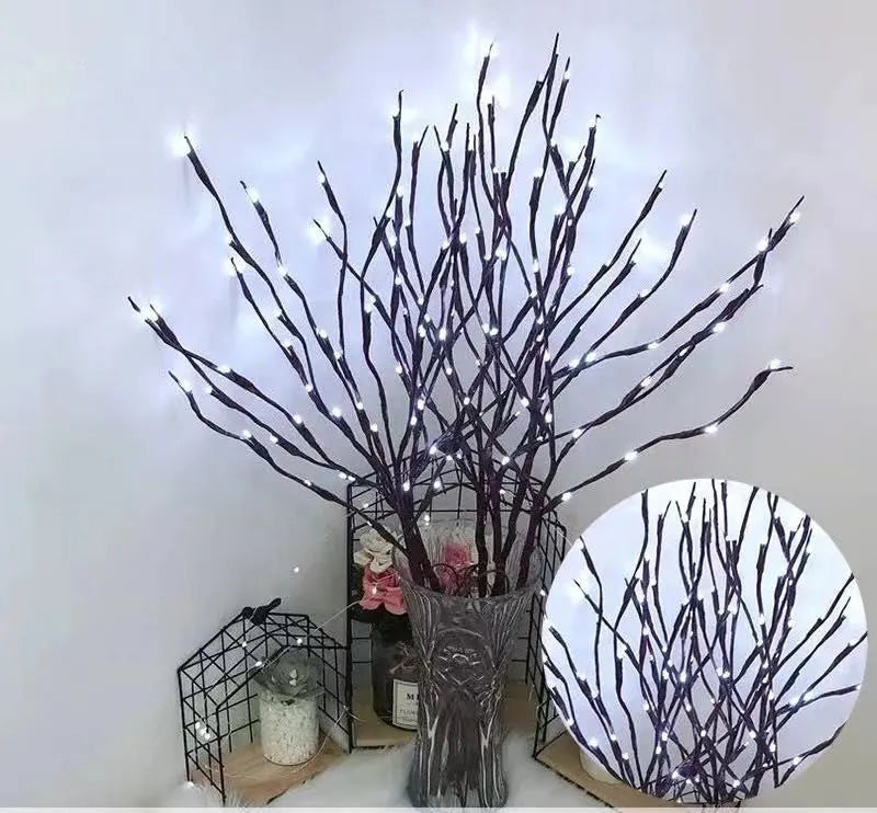 LED decorative tree light in a vase with colourful or warm white lighting options.