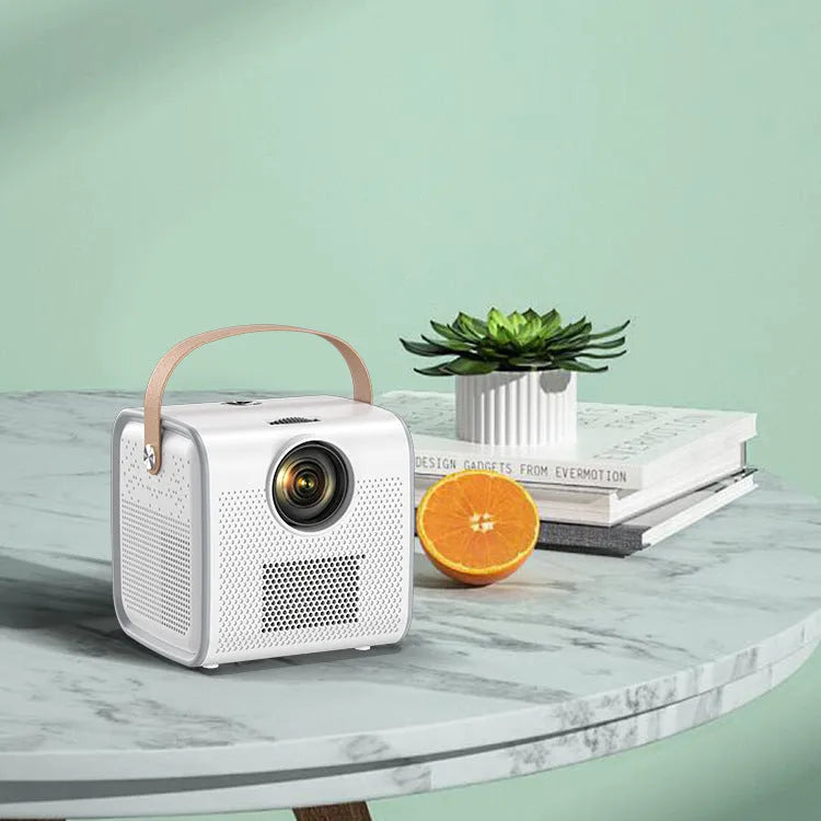 Full HD mini projector 1080P 3000 lumens LED with remote control and cables on table
