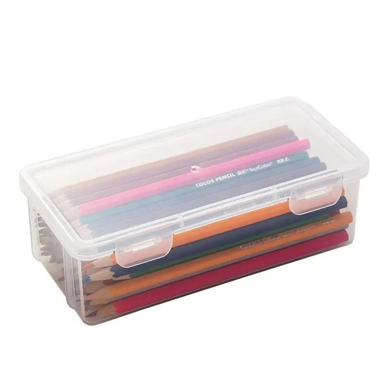 Transparent plastic pencil storage box for organising pens and drawing tools