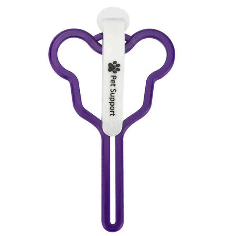 A hands-free dog poop bag holder with a fixed clip and adjustable black Velcro strap, shown attached to a dog lead.