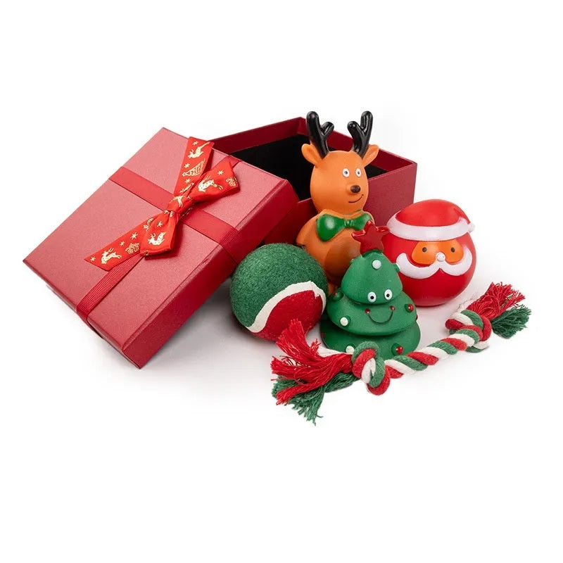 Christmas dog toy set showing vinyl bite-resistant toys in festive shapes including trees, balls, and reindeer