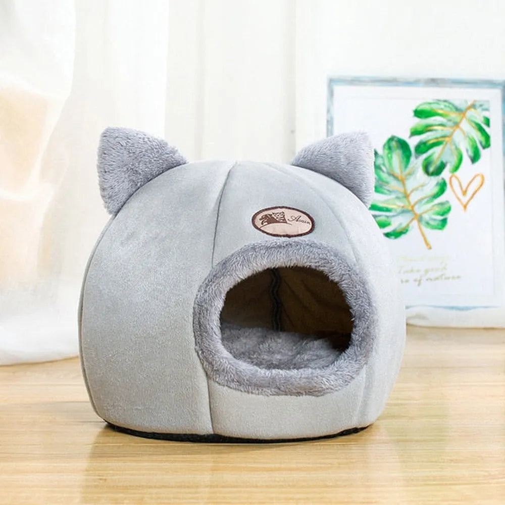 Large enclosed winter cat sofa bed with plush lining for indoor pet warmth