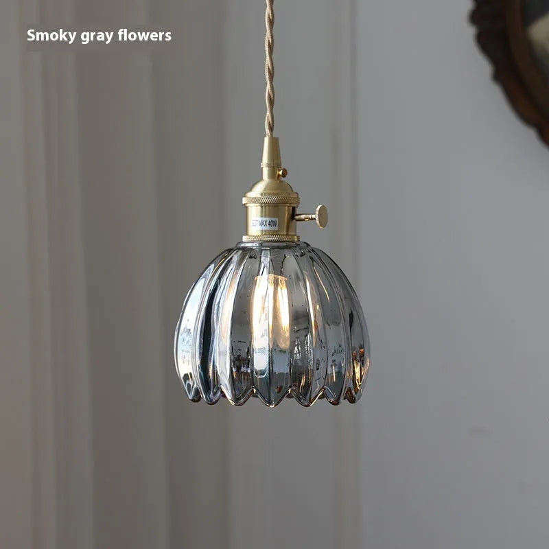 Nordic style bedside chandelier with a vintage glass flower shade in a choice of five colours.