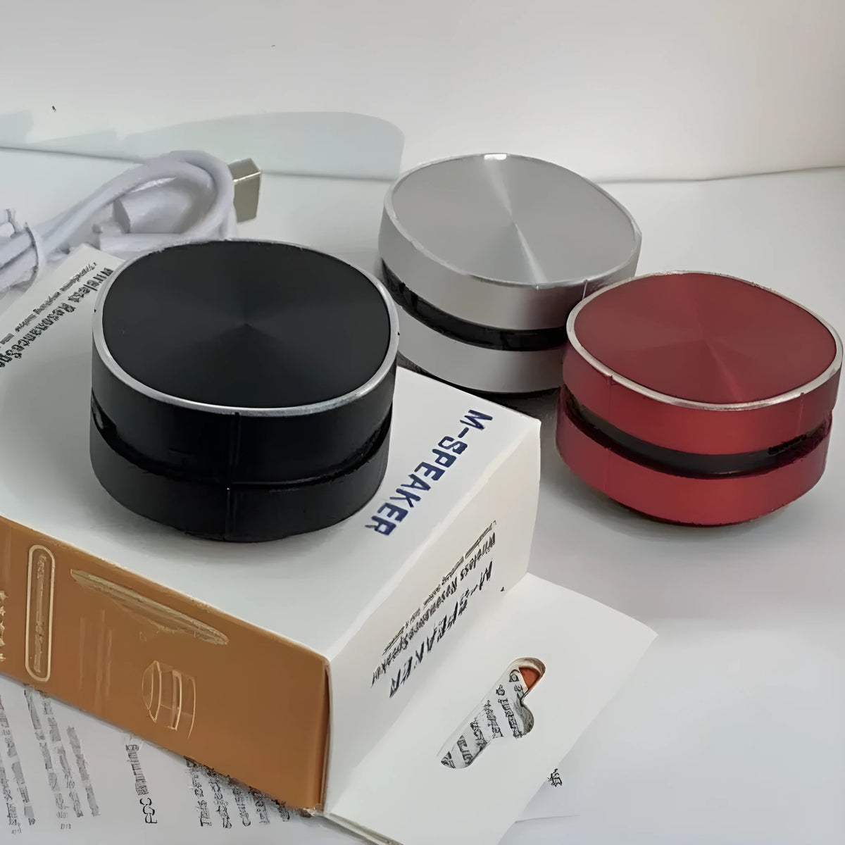 Bone conduction Bluetooth speaker in black, red or silver with USB power, 5W output and voice prompt