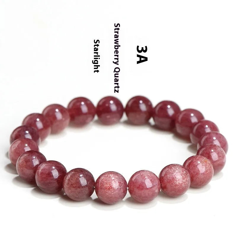 Natural strawberry quartz bracelet with geometric beads in starlight cherry red colour on wrist
