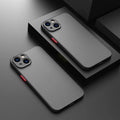 Black frosted hard iPhone case with fine hole skin-sensing design on a table.