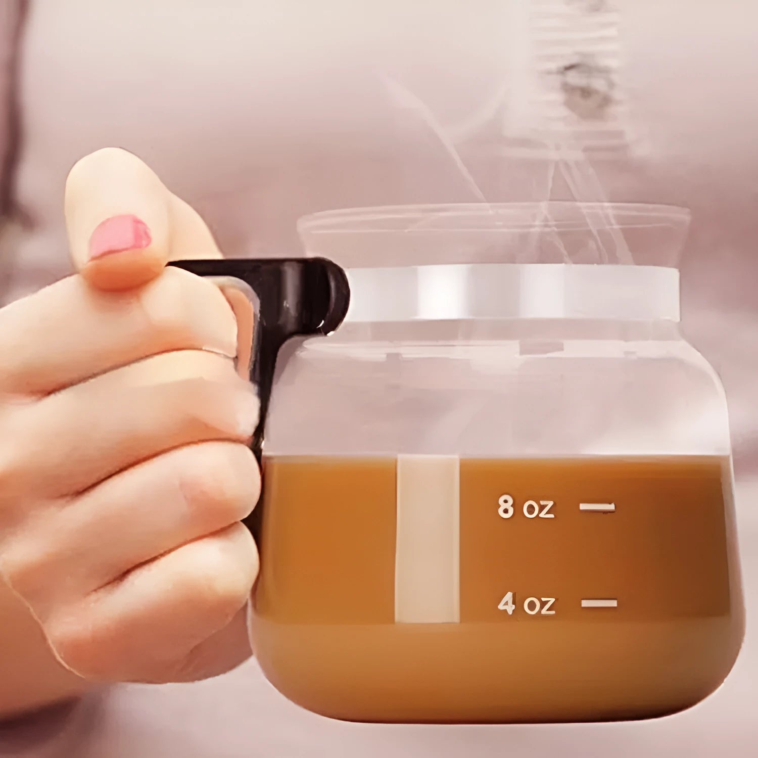 Transparent borosilicate glass coffee maker with black silicone cover