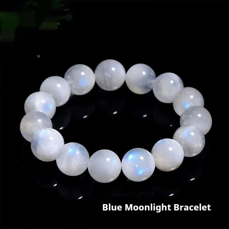 Natural blue moonlight polished round moonstone bead bracelet on a white background.