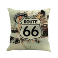 Route 66 landscape pattern linen blend cushion cover on a grey sofa.