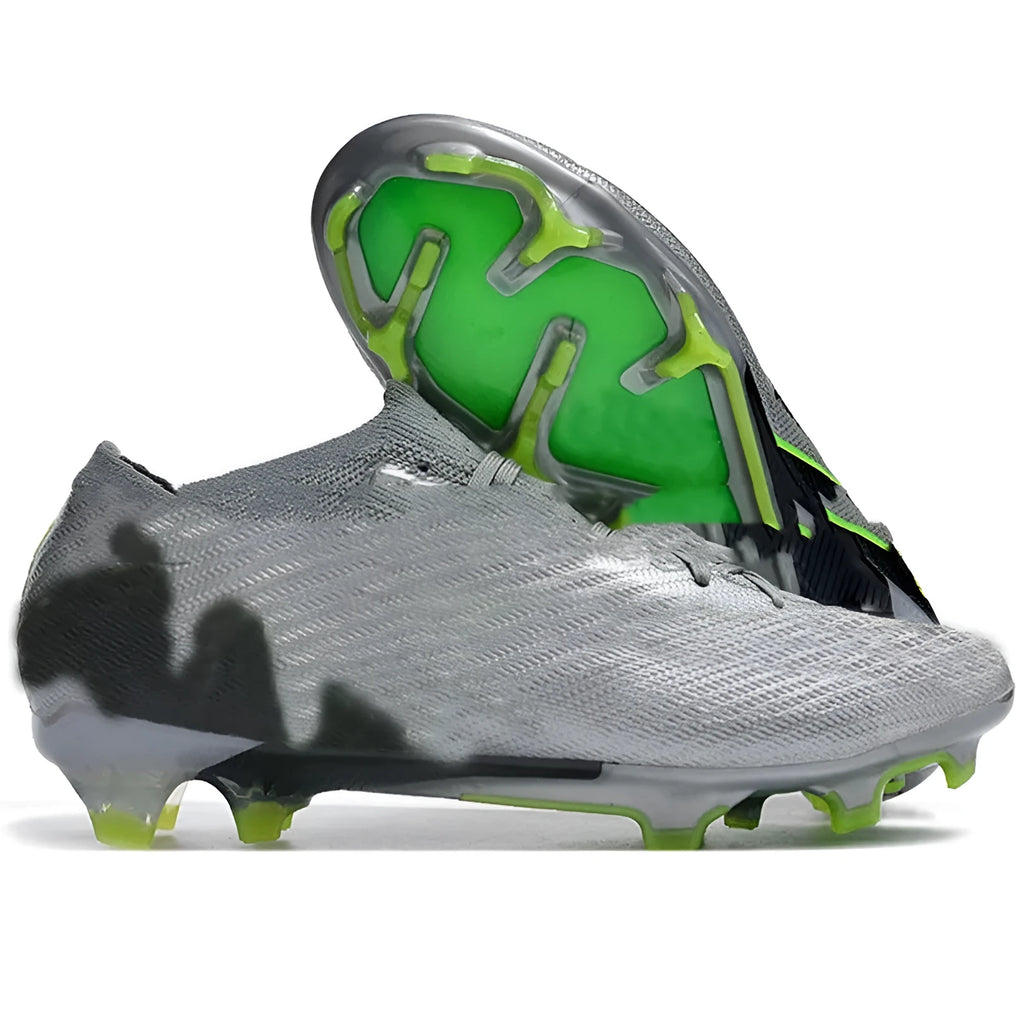 Men's black football shoes with knitted upper, FG studs, and lace-up closure shown on grass surface