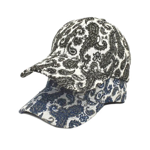 Blue polyester baseball cap with printed paisley pattern showing dome crown design