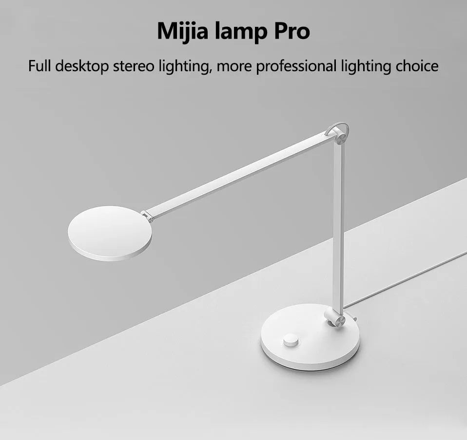 ProLED folding desk lamp with adjustable smart controls on a wooden desk.