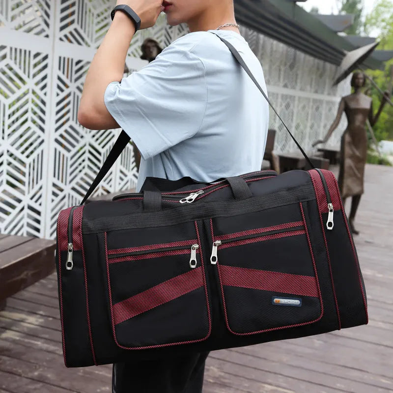 Foldable large capacity tote travel bag in Oxford cloth with zipper opening and soft handle, available in blue, grey, khaki, red