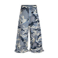 Man and woman wearing loose-fit snow camouflage blue jeans made from stretch cotton denim.