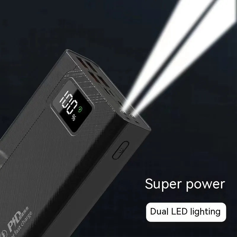 Black and white high capacity power bank showing front view with dimensions