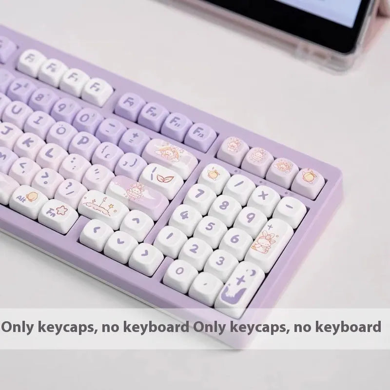 Set of purple gradient key caps with a rabbit graphic, shown on a mechanical keyboard.
