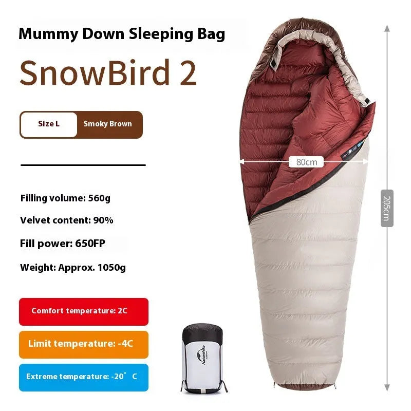Snowbird goose down mummy sleeping bag in snowbird colour with storage bag.
