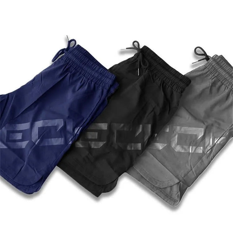 Men's elastic running shorts in black with quick-drying fabric and knee-length design