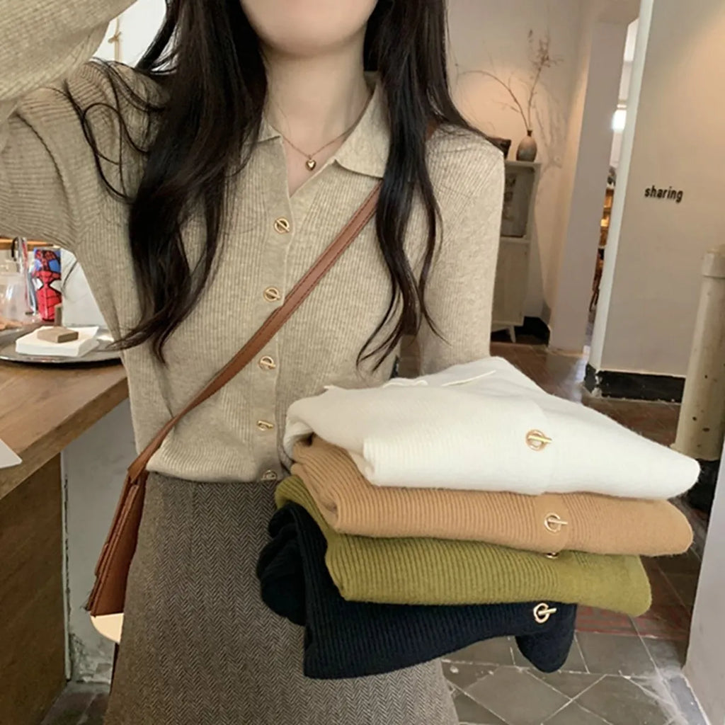 Long-sleeve loose-fit viscose knitted cardigan top in oatmeal colour.