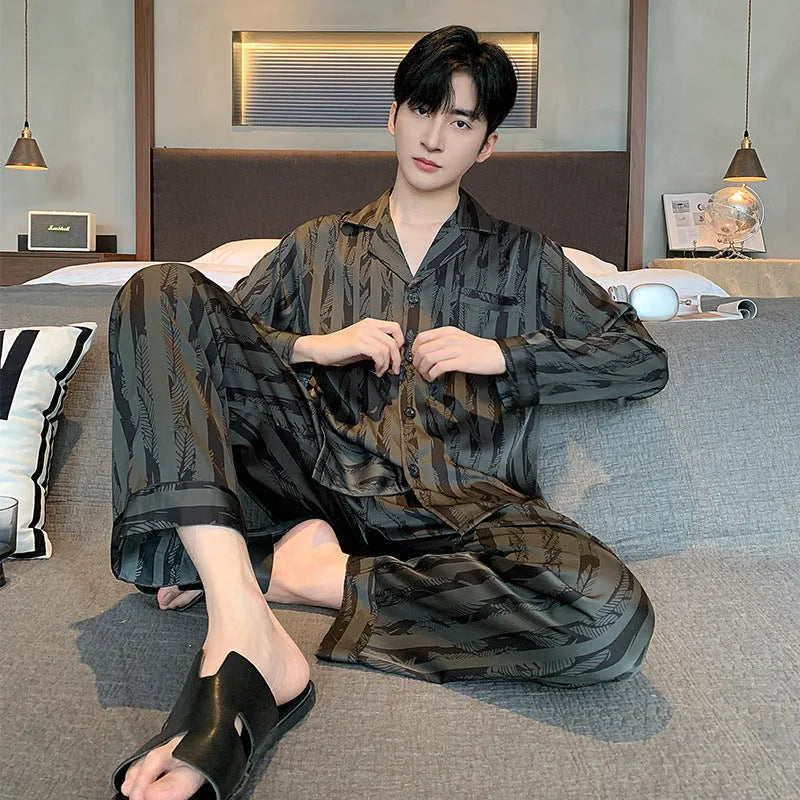 Men's black striped ice silk pajama set with V-neck top and elastic trousers
