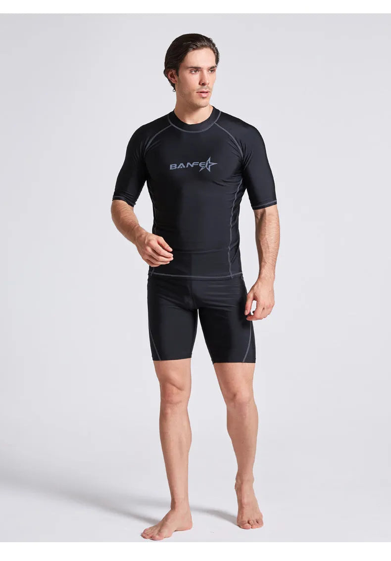 Men's blue quick-dry half sleeve swimsuit for surfing and snorkelling with nylon fabric