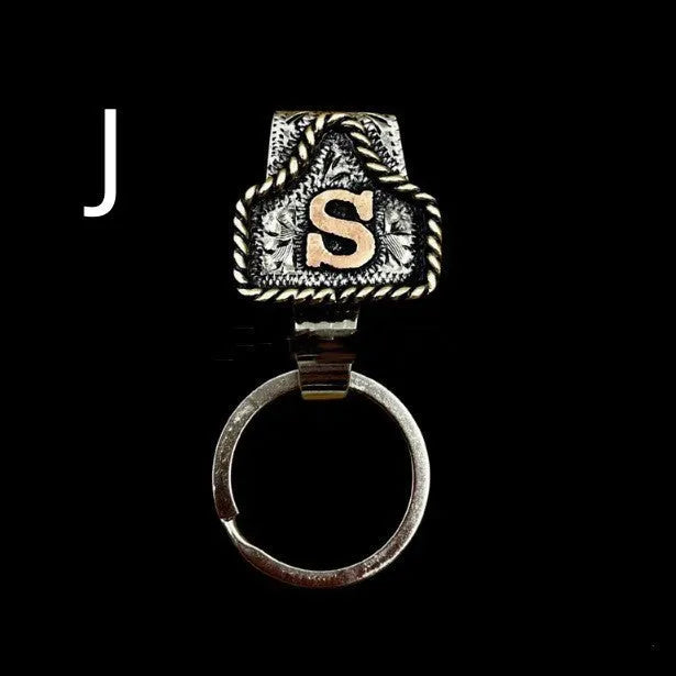 Handmade metal cow tag belt keychain in rustic design with multiple colour options