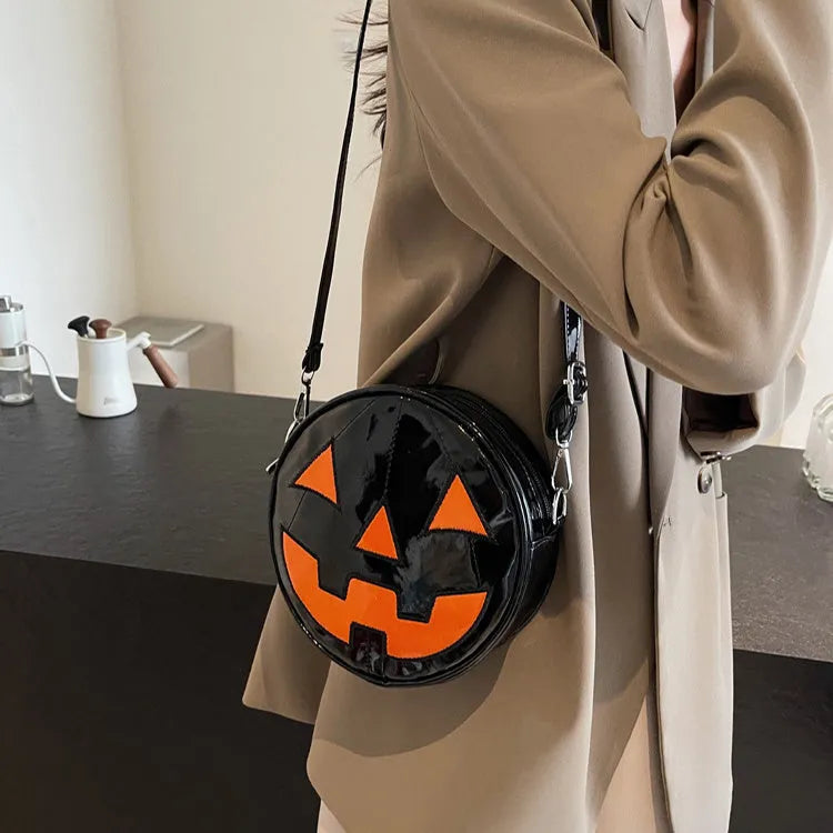 Small round pumpkin-shaped PU shoulder bag in orange for Halloween