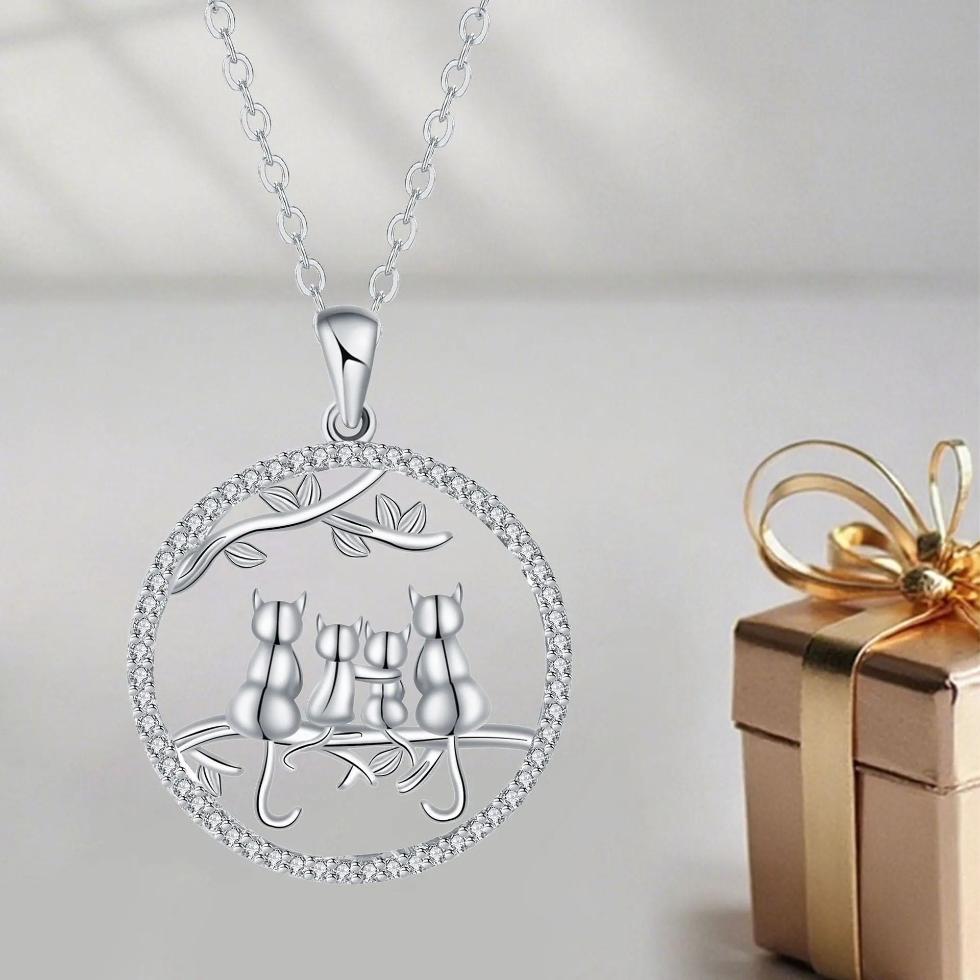 Four kitten pendant necklace on copper cross chain for women