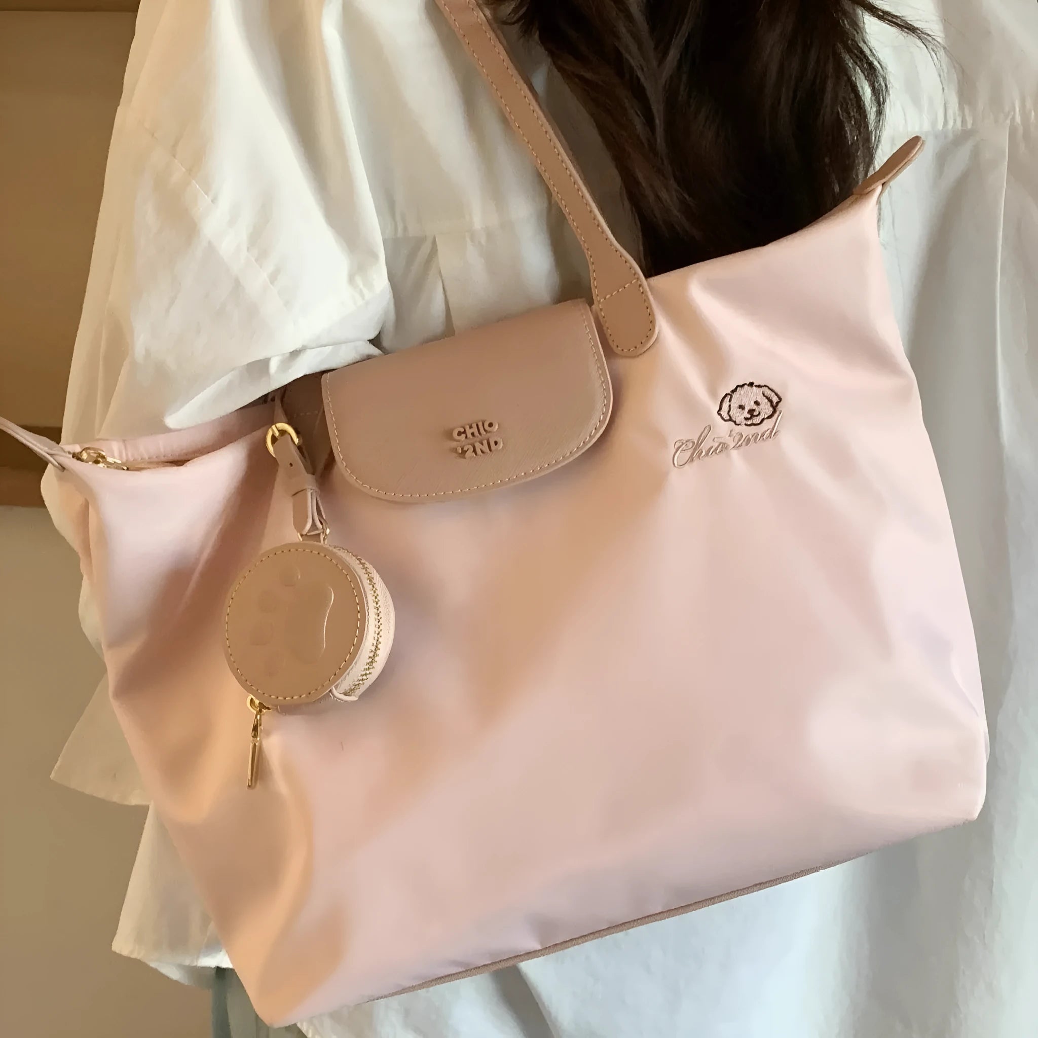 Large capacity Oxford cloth tote bag with sandwich pocket design and mobile phone compartment in pink colour