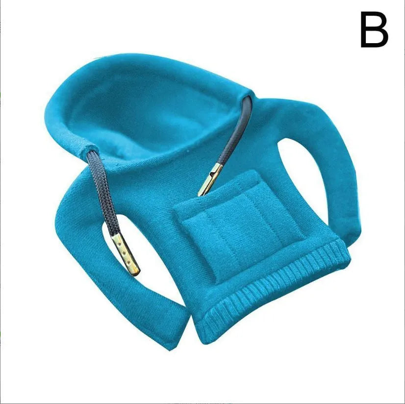 Cloth gear shift knob hoodie cover shown in multiple colours next to a car gear lever.