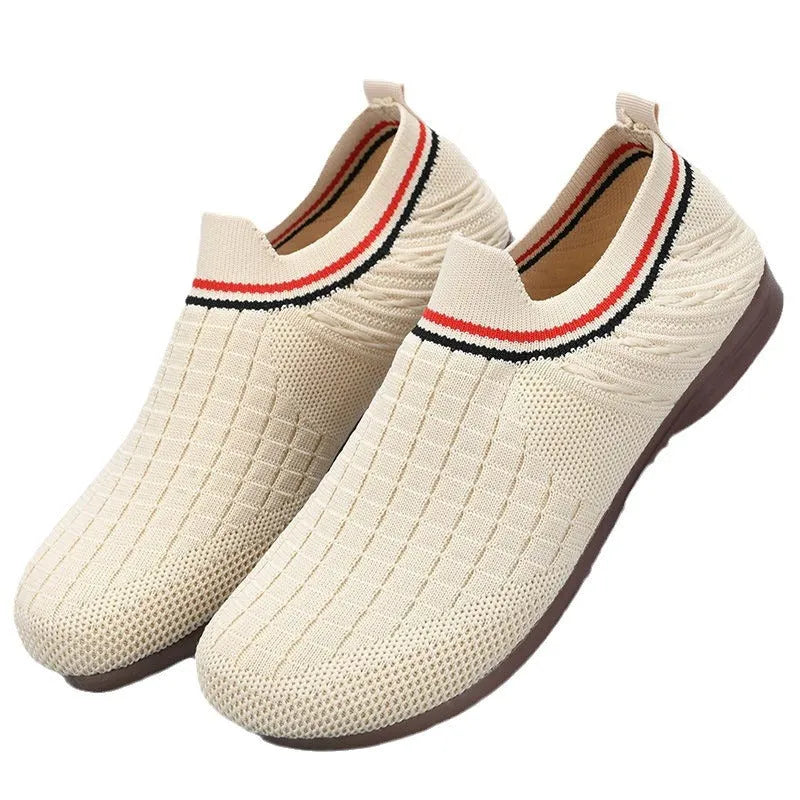 Women's casual slip-on shoes with breathable mesh upper, non-slip rubber sole, low heel, in black