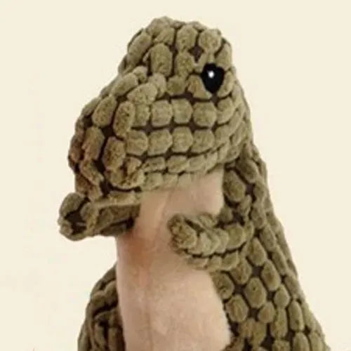 Grey, green, and orange durable rubber dog toy with sound feature for chewing and training.
