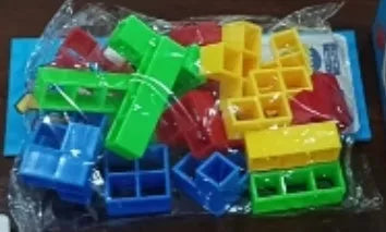 Plastic balance stacking game with 16 colourful building blocks on chassis