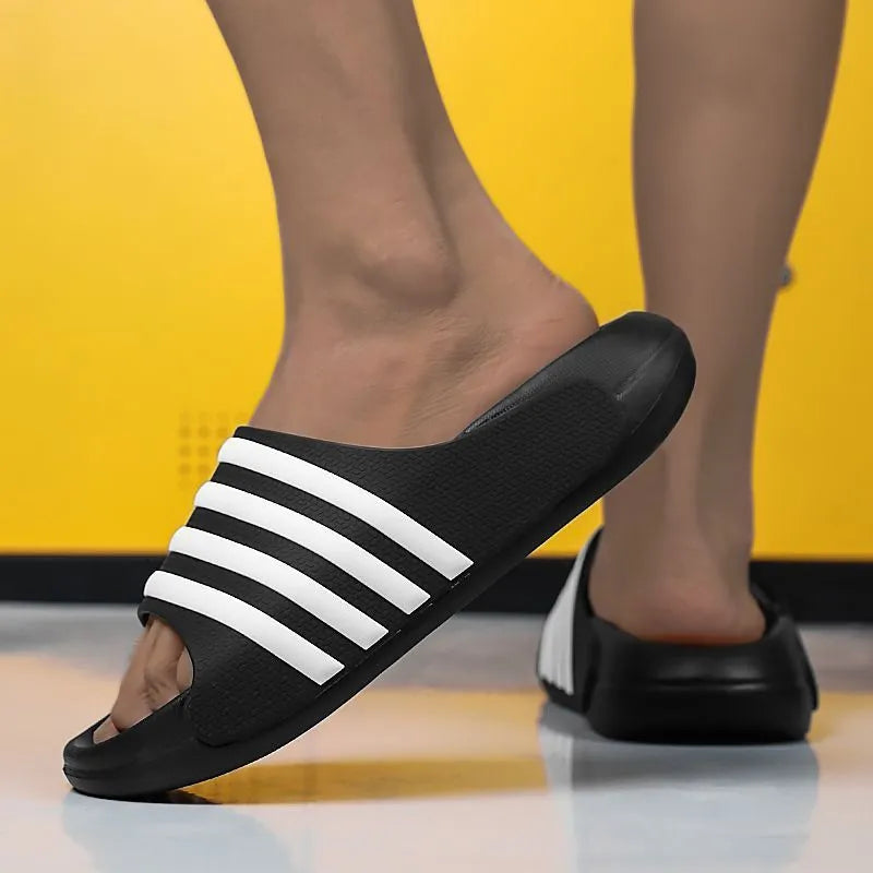 Casual unisex slippers with a PVC upper and EVA sole, shown in beige, black and white, blue and white, and green colour options.