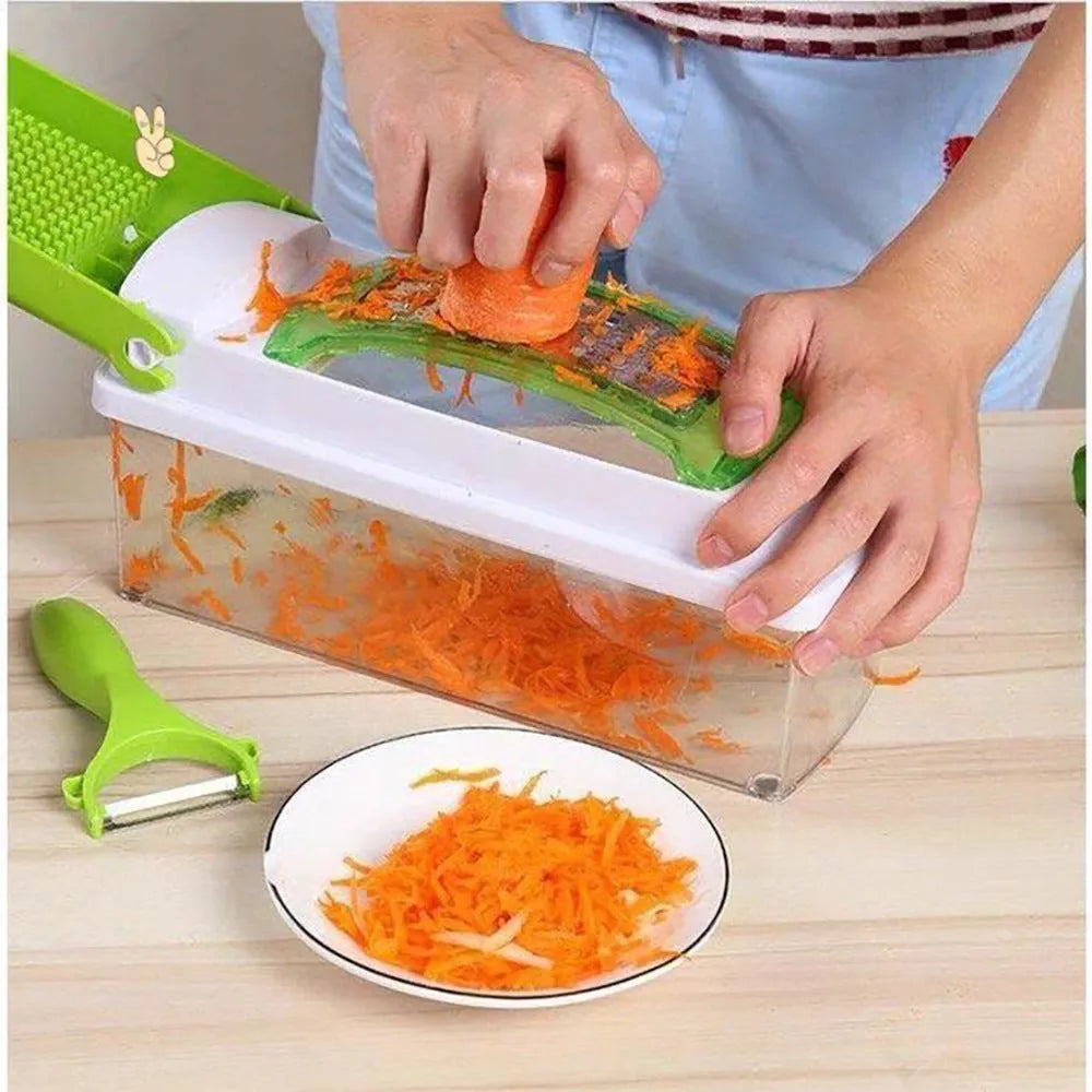 Green manual vegetable chopper with stainless steel blades on a kitchen counter