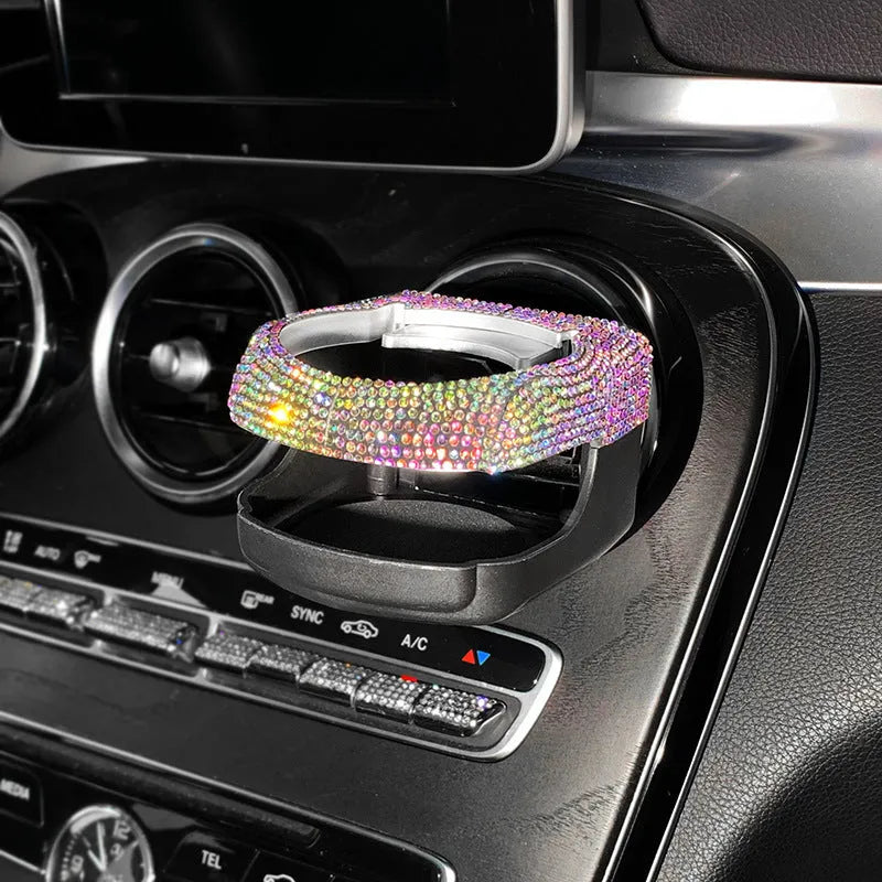 White diamond rhinestone car air vent cup holder bracket showing clip mechanism