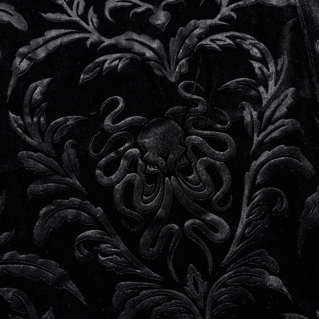 Black velvet men's shirt with pointed collar and decorative flocking details in British preppy style