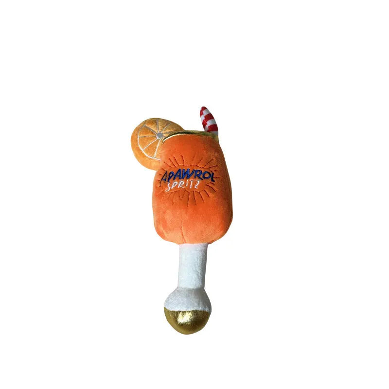 Yellow plush beer bottle shaped squeaky dog toy with teeth cleaning feature