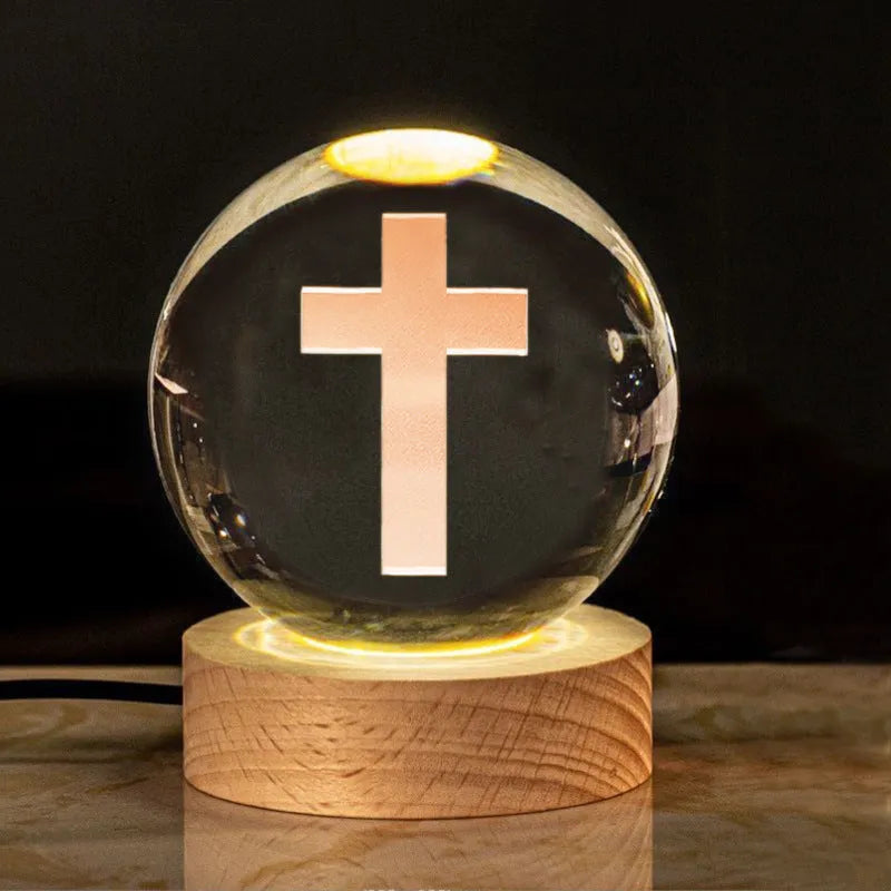 6cm white crystal religious ornament on wooden base with warm lighting