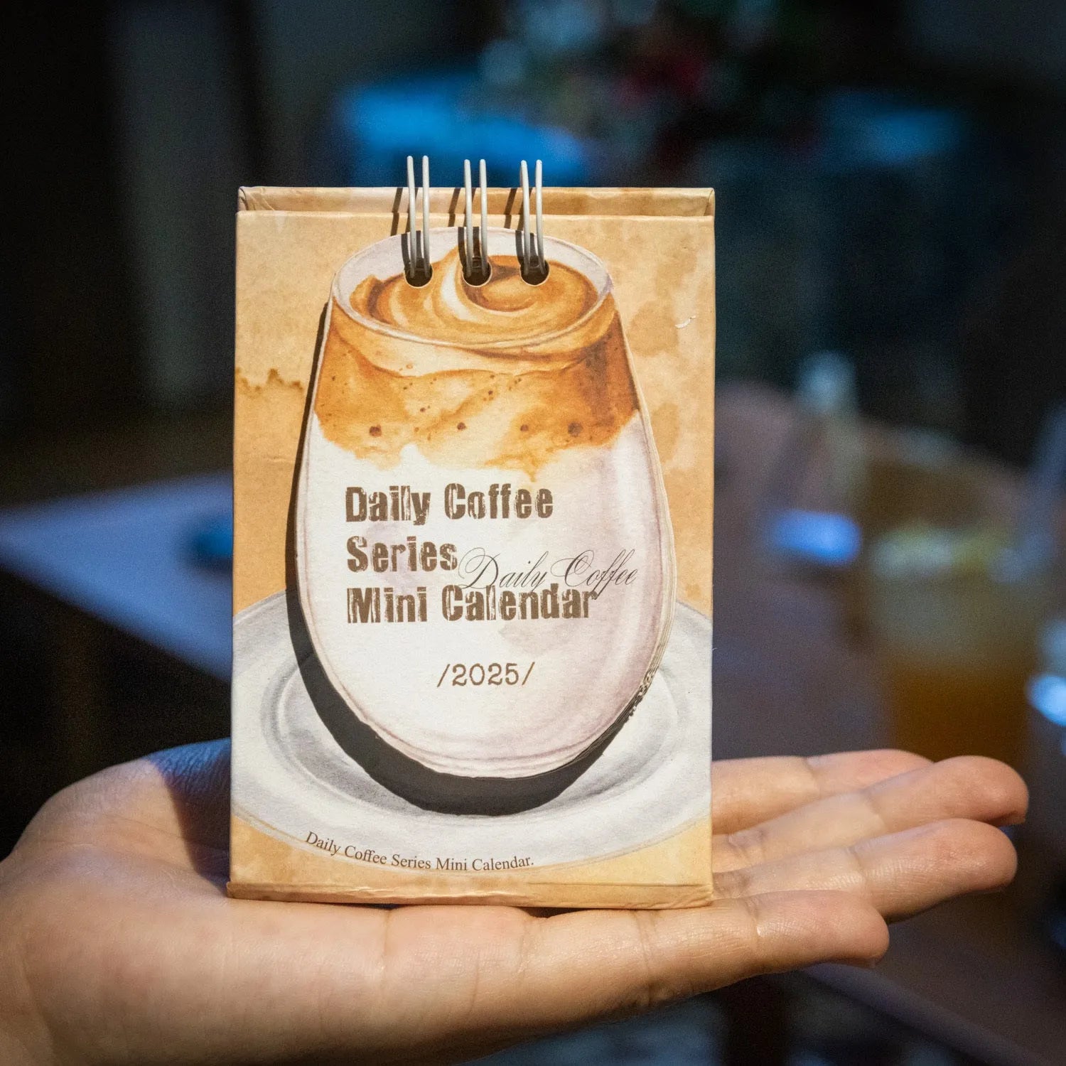 Mini 2025 desk calendar showing coffee theme with motivational design