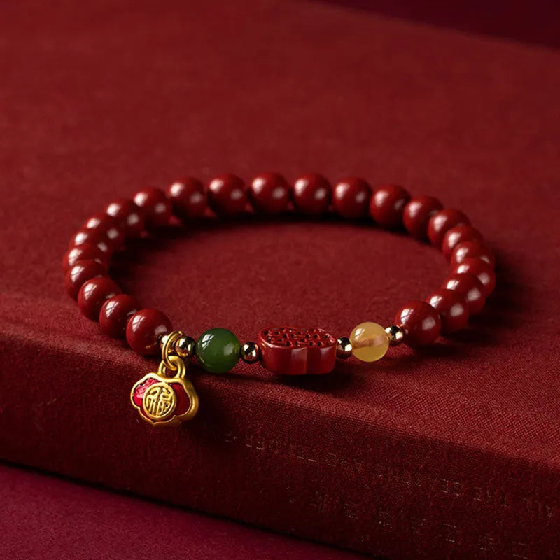 Emperor Sandstone bead bracelet with Fu character charm in New Chinese style.