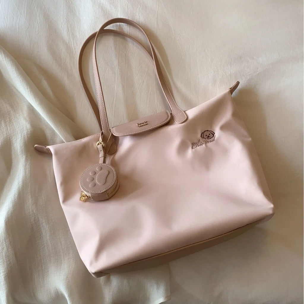 Large capacity Oxford cloth tote bag with sandwich pocket design and mobile phone compartment in pink colour